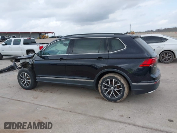 2020 Volkswagen Tiguan SE with VIN 3VV3B7AX7LM067046, listed as a IAAI auction lot 41697405 with 53,573 mi miles and . Bid and sale history available at DreamBid. Image 14.
