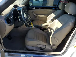 2015 Volkswagen Beetle with VIN 3VW7S7AT1FM818382, listed as a Copart auction lot 41666205 with 47,429 mi miles and Salvage Title. Bid and sale history available at DreamBid. Image 7.