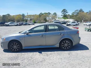 2017 Mitsubishi Lancer ES with VIN JA32U2FU1HU007318, listed as a IAAI auction lot 41908084 with 159,564 mi miles. Bid and sale history available at carsss.com. Image 14.