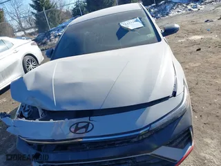 2025 Hyundai Elantra N with VIN KMHLW4DK9SU023797, listed as a IAAI auction lot 41433306 with 2,019 mi miles. Bid and sale history available at carsss.com. Image 12.
