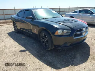 2012 Dodge Charger SE with VIN 2C3CDXBG2CH117670, listed as a IAAI auction lot 41996499 with 233,633 mi miles. Bid and sale history available at carsss.com. Image 1.