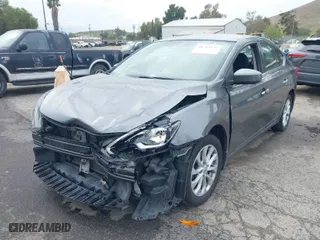 2019 Nissan Sentra S with VIN 3N1AB7AP9KY336504, listed as a IAAI auction lot 41765835 with 67,921 mi miles. Bid and sale history available at carsss.com. Image 2.
