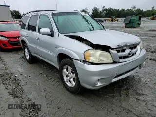 2006 Mazda Tribute i with VIN 4F2YZ02Z26KM14821, listed as a Copart auction lot 71718434 with 318,841 mi miles and Salvage Title. Bid and sale history available at carsss.com. Image 10.