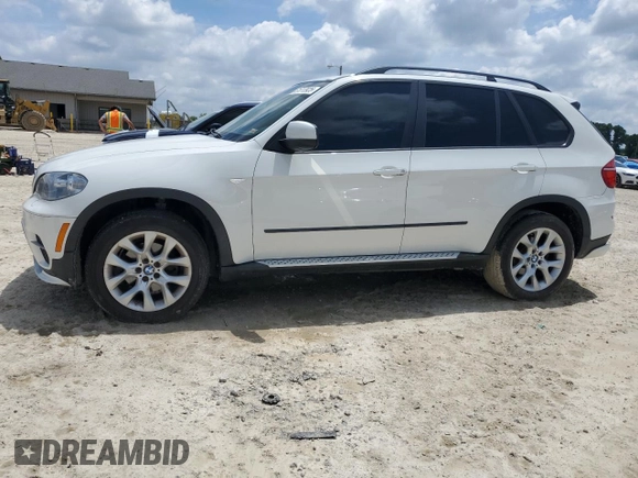 2012 BMW X5 35i с VIN 5UXZV4C58CL987049, выставлен на аукционе Copart как лот 61013925 с пробегом 167 508 миль миль и Чистый • Clean title. История ставок и продаж доступна на DreamBid. Изображение 1.