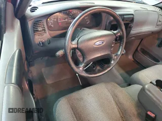 2001 Ford Ranger XL with VIN 1FTYR10C61TA40124, listed as a Copart auction lot 48943325 with 196,810 mi miles and Salvage title. Bid and sale history available at DreamBid. Image 8.