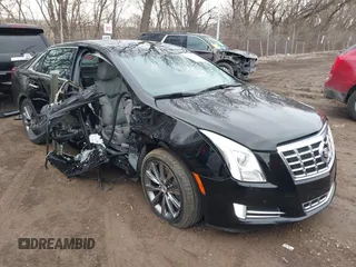 2013 Cadillac XTS Luxury with VIN 2G61R5S31D9221345, listed as a IAAI auction lot 41547095 with 148,070 mi miles. Bid and sale history available at carsss.com. Image 1.