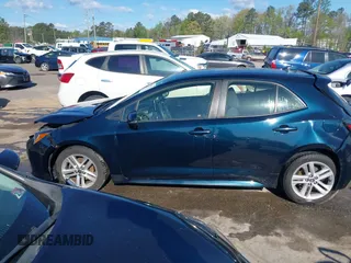 2019 Toyota Corolla Hatchback SE with VIN JTNK4RBE1K3024766, listed as a IAAI auction lot 42037121 with 121,595 mi miles. Bid and sale history available at carsss.com. Image 14.