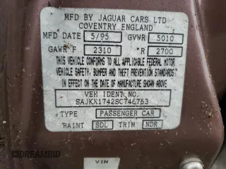 1995 Jaguar XJ with VIN SAJKX1742SC746763, listed as a Copart auction lot 84949964 with Not Provided miles and Clean Title. Bid and sale history available at DreamBid. Image 12.