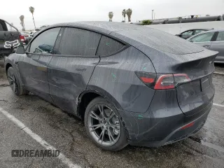 2025 Tesla Model Y Long Range with VIN 7SAYGAEE3SF216635, listed as a Copart auction lot 44614555 with 400 mi miles and Salvage Title. Bid and sale history available at DreamBid. Image 2.