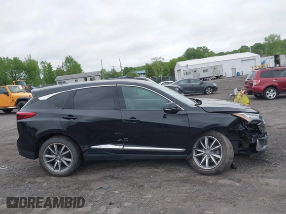2020 Acura RDX Technology with VIN 5J8TC2H50LL010337, listed as a IAAI auction lot 42291855 with 82,876 mi miles and . Bid and sale history available at DreamBid. Image 13.