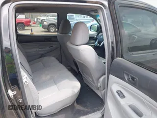 2015 Toyota Tacoma PreRunner with VIN 3TMJU4GN5FM189557, listed as a IAAI auction lot 42387542 with 189,188 mi miles and . Bid and sale history available at DreamBid. Image 8.