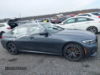 2019 BMW 3 Series 330i xDrive with VIN WBA5R7C54KFH24284, listed as a IAAI auction lot 41246406 with 57,200 mi miles. Bid and sale history available at carsss.com. Image 13.