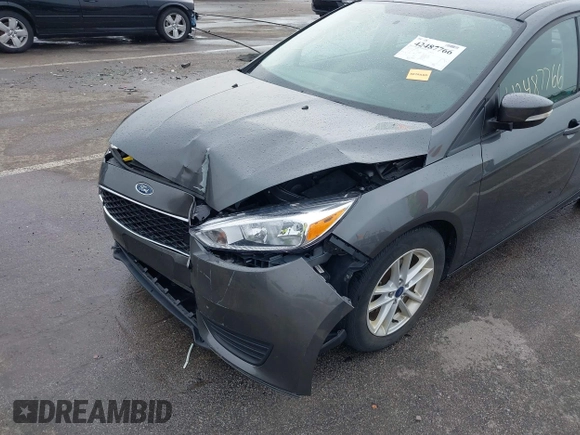 2017 Ford Focus SE with VIN 1FADP3F28HL235303, listed as a IAAI auction lot 42487766 with 92,187 mi miles and . Bid and sale history available at DreamBid. Image 6.