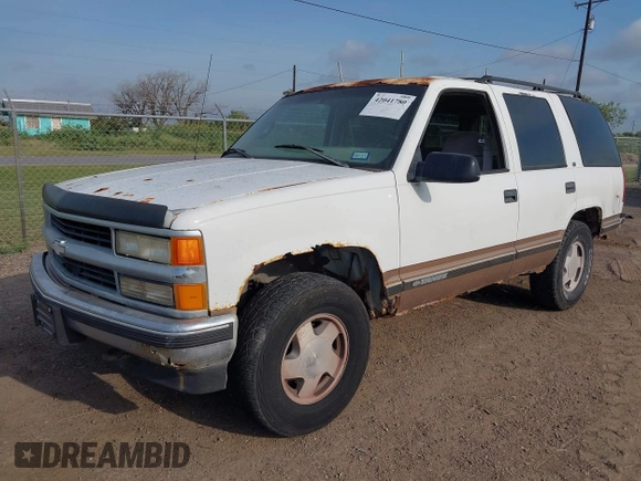 1997 Chevrolet Tahoe z VIN 1GNEK13R3VJ416827, wystawiony jako IAAI lot #42041780 z przebiegiem 143 566 mil mil oraz . Historia ofert i sprzedaży dostępna na DreamBid. Obrazek 2.
