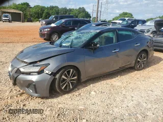 2021 Nissan Maxima SV with VIN 1N4AA6CV2MC502420, listed as a Copart auction lot 55769205 with 76,172 mi miles and Salvage title. Bid and sale history available at DreamBid. Image 1.