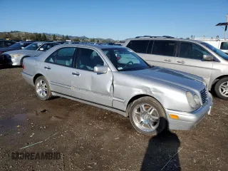 1998 Mercedes-Benz E-Class with VIN WDBJF65F0WA555650, listed as a Copart auction lot 44067875 with 133,145 mi miles and Salvage Title. Bid and sale history available at carsss.com. Image 4.
