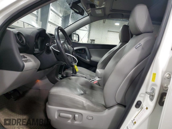 2010 Toyota RAV4 Ltd with VIN JTMDK4DV4AD015667, listed as a Copart auction lot 52494325 with 157,607 mi miles and Salvage Title. Bid and sale history available at carsss.com. Image 7.