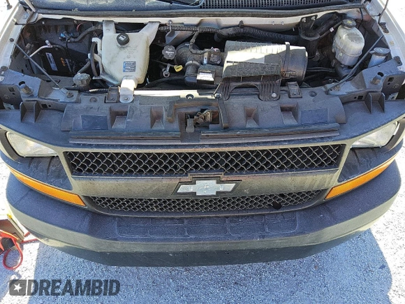 2017 Chevrolet Express Cargo z VIN 1GCWGAFG1H1108729, wystawiony jako Copart lot #81936294 z przebiegiem 156 609 mil mil oraz Czysty tytuł • Clean title. Historia ofert i sprzedaży dostępna na DreamBid. Obrazek 11.