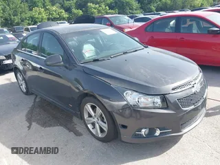 2014 Chevrolet Cruze 2LT z VIN 1G1PE5SBXE7380886, wystawiony jako IAAI lot #42266290 z przebiegiem 189 223 mil mil oraz . Historia ofert i sprzedaży dostępna na DreamBid. Obrazek 1.