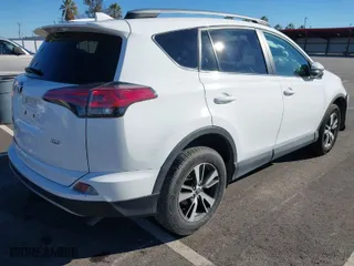 2018 Toyota RAV4 XLE with VIN 2T3WFREV8JW425027, listed as a IAAI auction lot 41272635 with 79,445 mi miles. Bid and sale history available at carsss.com. Image 4.