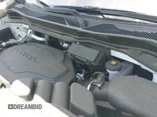 2025 Honda Passport EX-L with VIN 5FNYF8H55SB011791, listed as a IAAI auction lot 42749643 with 12,183 mi miles and . Bid and sale history available at DreamBid. Image 19.
