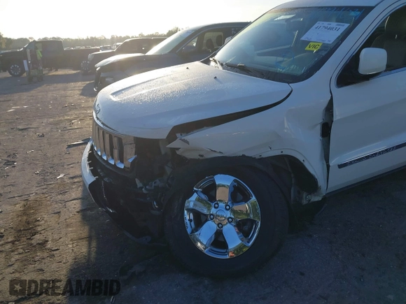 2011 Jeep Grand Cherokee Laredo with VIN 1J4RS4GGXBC739433, listed as a IAAI auction lot 41794031 with 174,672 mi miles and . Bid and sale history available at DreamBid. Image 6.