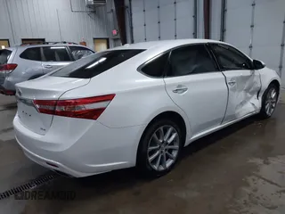 2014 Toyota Avalon Limited with VIN 4T1BK1EB6EU100635, listed as a IAAI auction lot 41609581 with 128,609 mi miles. Bid and sale history available at carsss.com. Image 4.