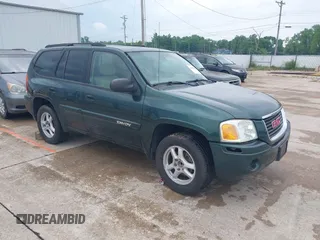 2004 GMC Envoy SLE z VIN 1GKDS13S242374316, wystawiony jako IAAI lot #42422803 z przebiegiem 220 071 mil mil oraz . Historia ofert i sprzedaży dostępna na DreamBid. Obrazek 1.