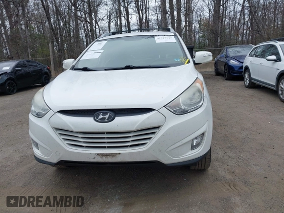 2013 Hyundai Tucson GLS with VIN KM8JU3AC5DU693550, listed as a IAAI auction lot 41919615 with 202,517 mi miles. Bid and sale history available at carsss.com. Image 12.