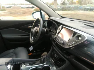 2019 Buick Envision Premium with VIN LRBFX3SX6KD008390, listed as a IAAI auction lot 40948209 with 16,545 mi miles and . Bid and sale history available at carsss.com. Image 5.