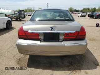 2003 Mercury Grand Marquis GS Convenience z VIN 2MEFM74WX3X619151, wystawiony jako Copart lot #55512335 z przebiegiem 101 627 mil mil oraz Szkoda całkowita • Salvage title. Historia ofert i sprzedaży dostępna na DreamBid. Obrazek 6.
