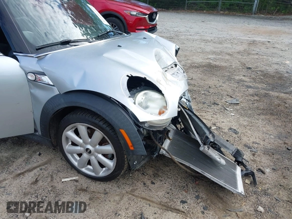 2007 MINI Hardtop S with VIN WMWMF73537TL88038, listed as a IAAI auction lot 42200252 with 70,603 mi miles and . Bid and sale history available at DreamBid. Image 6.