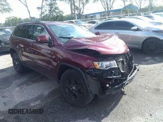 2017 Jeep Grand Cherokee Laredo with VIN 1C4RJFAG0HC739852, listed as a IAAI auction lot 41925736 with 146,851 mi miles and . Bid and sale history available at DreamBid. Image 1.