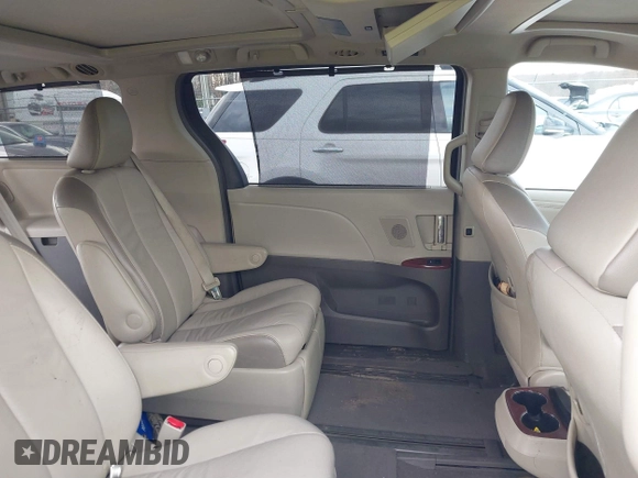2013 Toyota Sienna XLE with VIN 5TDDK3DC7DS068591, listed as a IAAI auction lot 41483280 with 197,599 mi miles and . Bid and sale history available at DreamBid. Image 8.