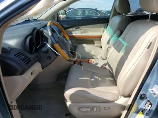 2008 Lexus RX 400h with VIN JTJHW31UX82070428, listed as a Copart auction lot 53703095 with 119,819 mi miles and Salvage Title. Bid and sale history available at DreamBid. Image 7.