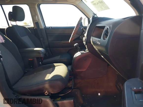 2014 Jeep Patriot Latitude with VIN 1C4NJPFB0ED719270, listed as a IAAI auction lot 40870355 with 207,613 mi miles and . Bid and sale history available at DreamBid. Image 5.