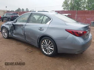 2018 Infiniti Q50 3.0t LUXE with VIN JN1EV7AP4JM357903, listed as a IAAI auction lot 41919730 with 130,858 mi miles. Bid and sale history available at carsss.com. Image 3.