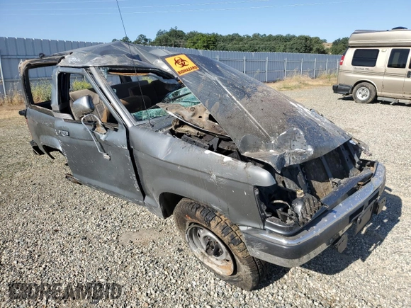 1989 Ford Bronco with VIN 1FMCU14T0KUA33910, listed as a Copart auction lot 57730195 with 53,335 mi miles and Salvage title. Bid and sale history available at DreamBid. Image 4.