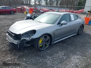 2012 Porsche Panamera with VIN WP0AA2A74CL016133, listed as a IAAI auction lot 41753535 with 84,569 mi miles. Bid and sale history available at carsss.com. Image 2.