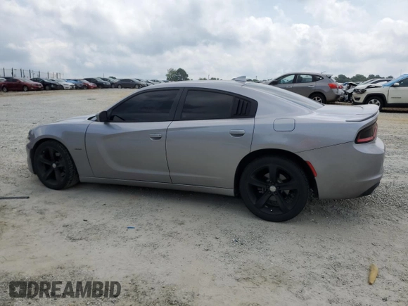 2016 Dodge Charger R/T with VIN 2C3CDXCTXGH222331, listed as a Copart auction lot 59428915 with 120,691 mi miles and Salvage title. Bid and sale history available at DreamBid. Image 2.