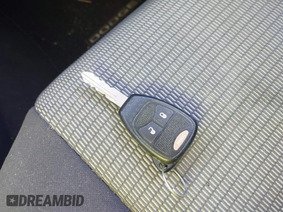 2009 Dodge Caliber SXT with VIN 1B3HB48A39D233105, listed as a IAAI auction lot 41872576 with Not Provided miles and . Bid and sale history available at DreamBid. Image 11.