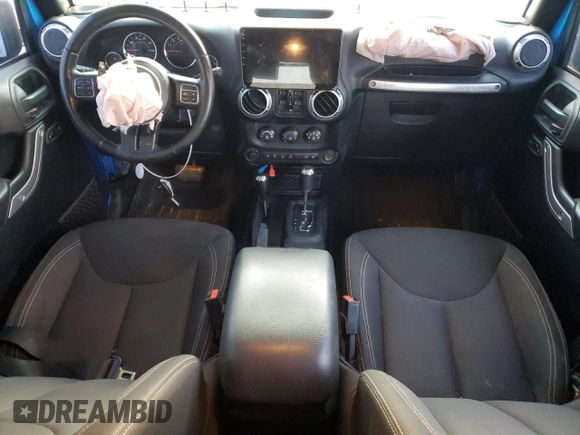 2015 Jeep Wrangler Unlimited Rubicon with VIN 1C4BJWFGXFL772056, listed as a Copart auction lot 48470425 with 106,367 mi miles and Salvage Title. Bid and sale history available at carsss.com. Image 8.