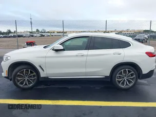 2020 BMW X4 xDrive30i z VIN 5UX2V1C02LLE68148, wystawiony jako IAAI lot #42253362 z przebiegiem 80 865 mil mil oraz . Historia ofert i sprzedaży dostępna na DreamBid. Obrazek 14.