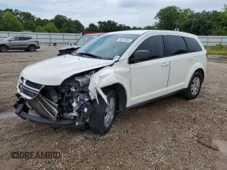 2013 Dodge Journey American Value with VIN 3C4PDCAB0DT734148, listed as a Copart auction lot 58517855 with 204,284 mi miles and Salvage title. Bid and sale history available at DreamBid. Image 1.
