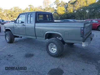 1986 Ford F-150 with VIN 1FTEX15N6GKA13863, listed as a Copart auction lot 76065584 with 203,343 mi miles and Salvage Title. Bid and sale history available at carsss.com. Image 2.