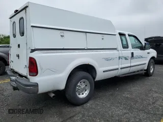 1999 Ford F-250 XL with VIN 1FTNX20L3XEA81807, listed as a Copart auction lot 58036385 with 251,614 mi miles and Salvage title. Bid and sale history available at DreamBid. Image 3.