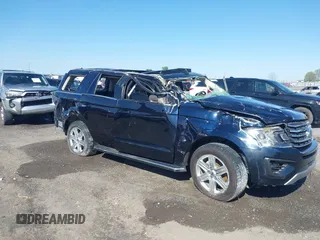 2021 Ford Expedition XLT with VIN 1FMJU1HT1MEA60855, listed as a IAAI auction lot 41962157 with 100,178 mi miles and . Bid and sale history available at DreamBid. Image 6.