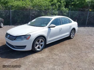 2012 Volkswagen Passat SE w/Sunroof with VIN 1VWBH7A39CC097668, listed as a IAAI auction lot 42100044 with 126,637 mi miles. Bid and sale history available at carsss.com. Image 2.