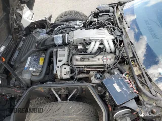 1990 Chevrolet Corvette z VIN 1G1YY2382L5115420, wystawiony jako Copart lot #57966615 z przebiegiem Nie podano mil oraz Tytuł czysty. Historia ofert i sprzedaży dostępna na DreamBid. Obrazek 11.