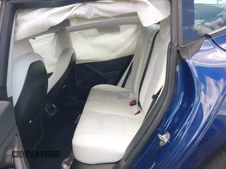 2022 Tesla Model 3 Long Range z VIN 5YJ3E1EBXNF168686, wystawiony jako IAAI lot #41933028 z przebiegiem 57 482 mil mil oraz . Historia ofert i sprzedaży dostępna na DreamBid. Obrazek 8.